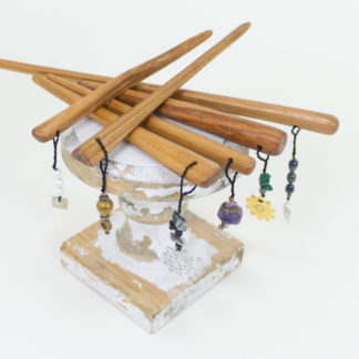 Assortment of hand-planed wooden hair sticks with decorative elements