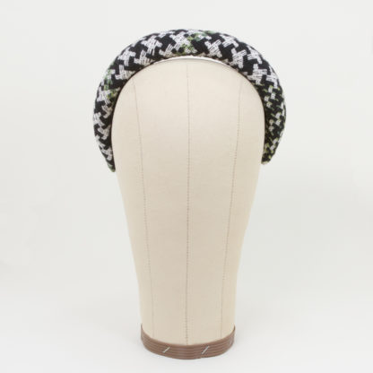 Padded headband in green white black bouclé front view