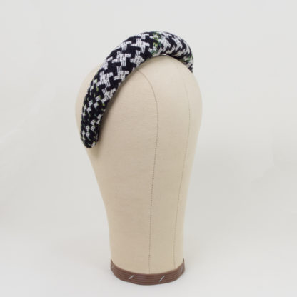 Padded headband in green white black bouclé side view